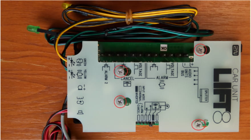 Loosening of the marked screws