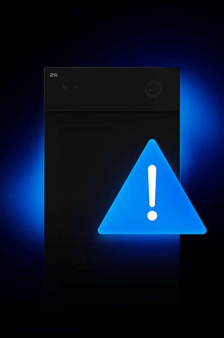 A dark electronic device with a bright, glowing blue triangle alert or warning symbol.