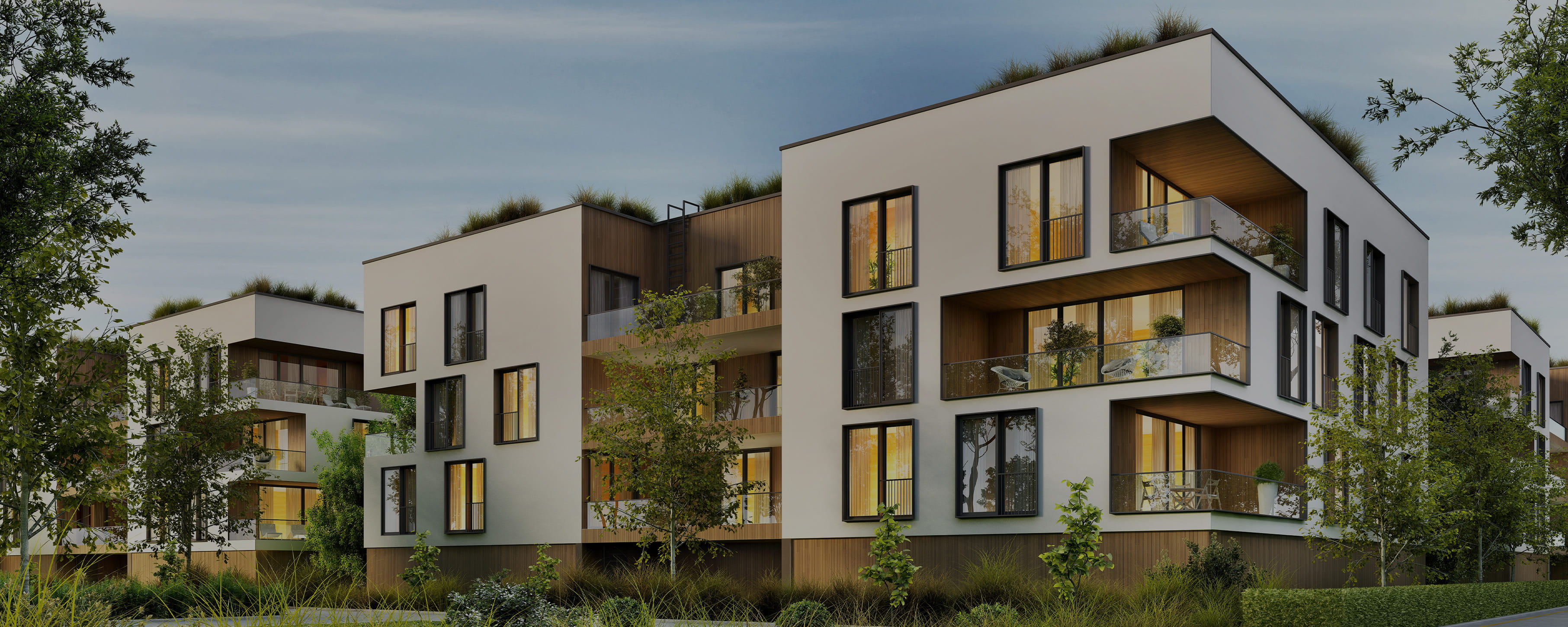 Moderni palazzi con grandi finestre, balconi e piante in un contesto urbano.