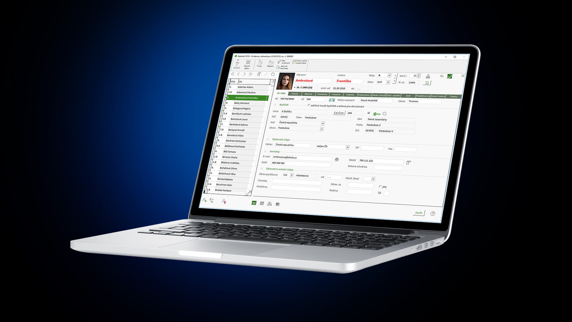 Laptop displaying a software interface with user details and settings on a dark blue gradient background.