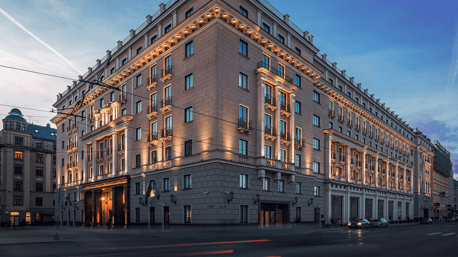 Grandhotel Kempinski shown from the corner with lights on the building secured by 2N products