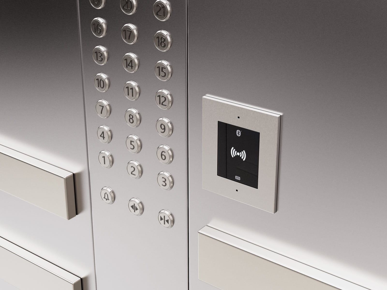 Close-up of an elevator control panel with metallic buttons and a black display screen.